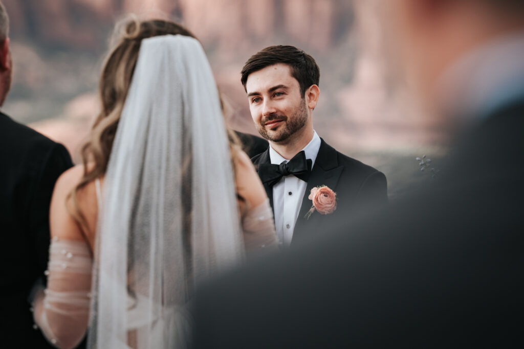 groom looking at bride in sedona at sky ranch lodge