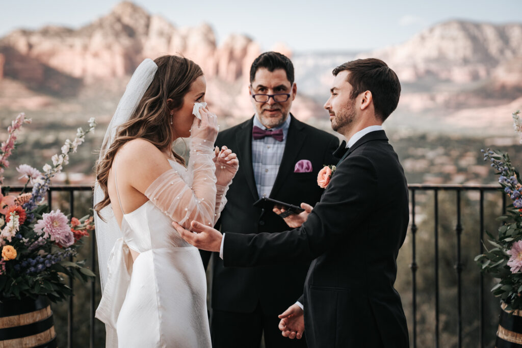 emotional moment at wedding ceremony at sky ranch lodge in sedona