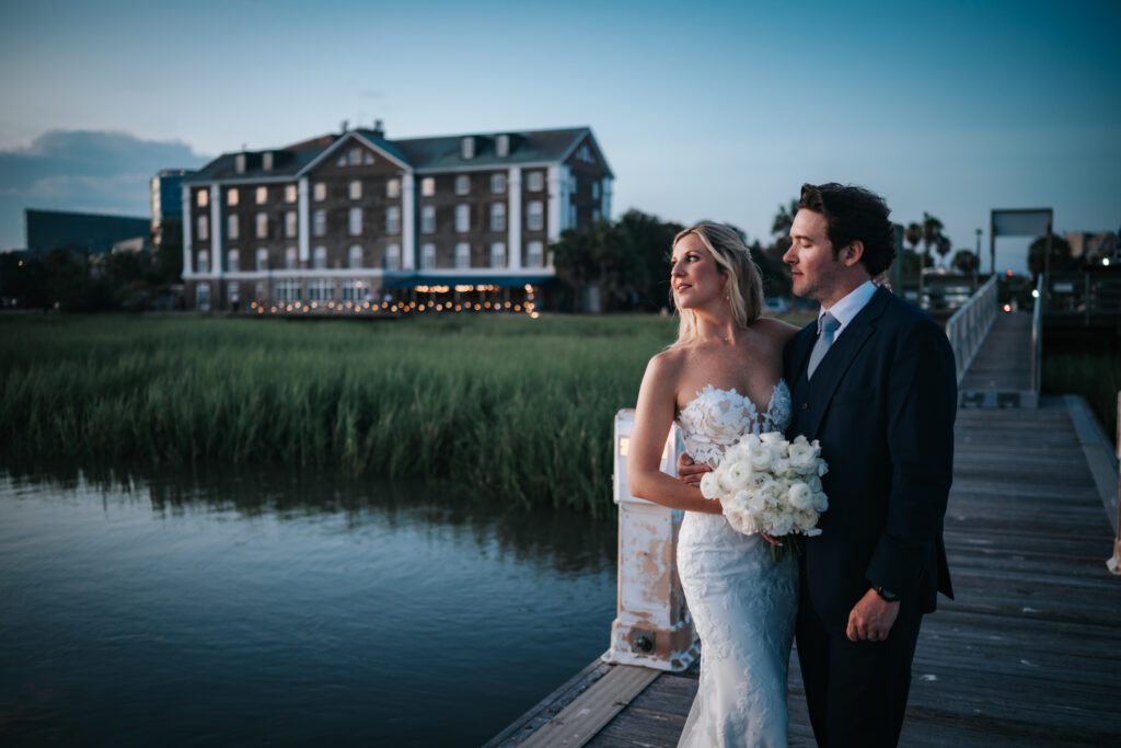 Bride and groom at sunset with the historic rice mill back drop