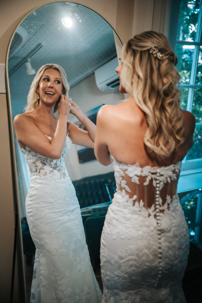 bride getting ready for her Historic rice mill wedding in charleston, sc
