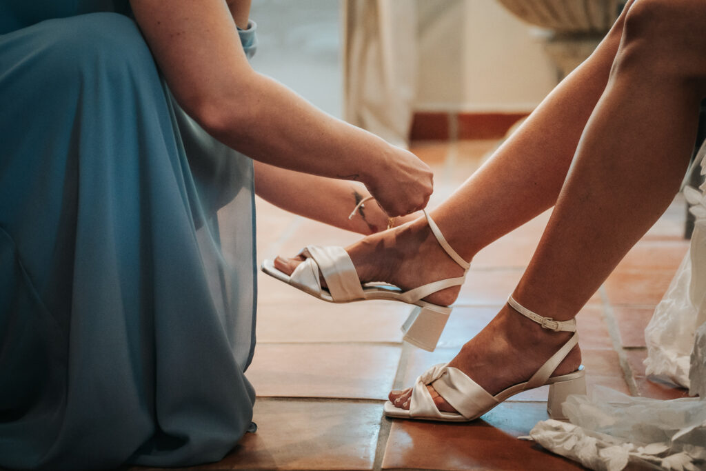 bride getting ready for her Historic rice mill wedding in charleston, sc