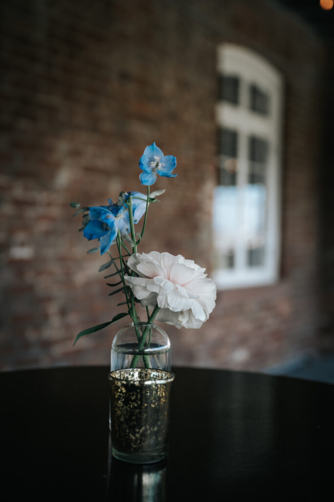 florals and table details by Tara Leclaire and The French Eclectic at a Rice Mill wedding in Charleston SC