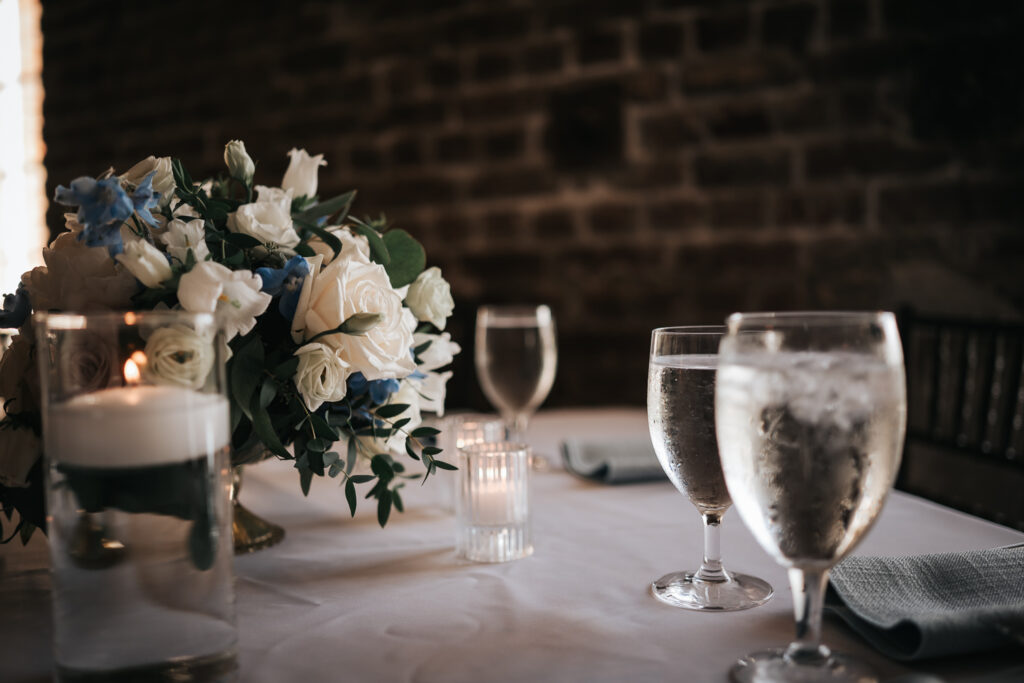 florals and table details by Tara Leclaire, Flora by Hannah and The French Eclectic at a Rice Mill wedding in Charleston SC