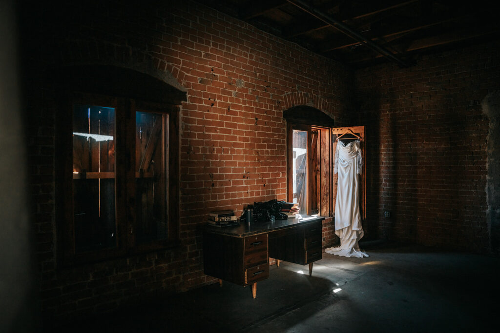 Wedding dress hanging in the bridal suite at The Icehouse Phoenix