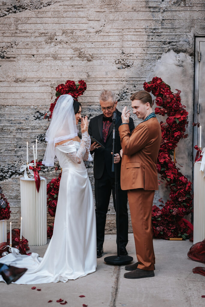 Bride and groom exchanging vows during an Icehouse Phoenix wedding